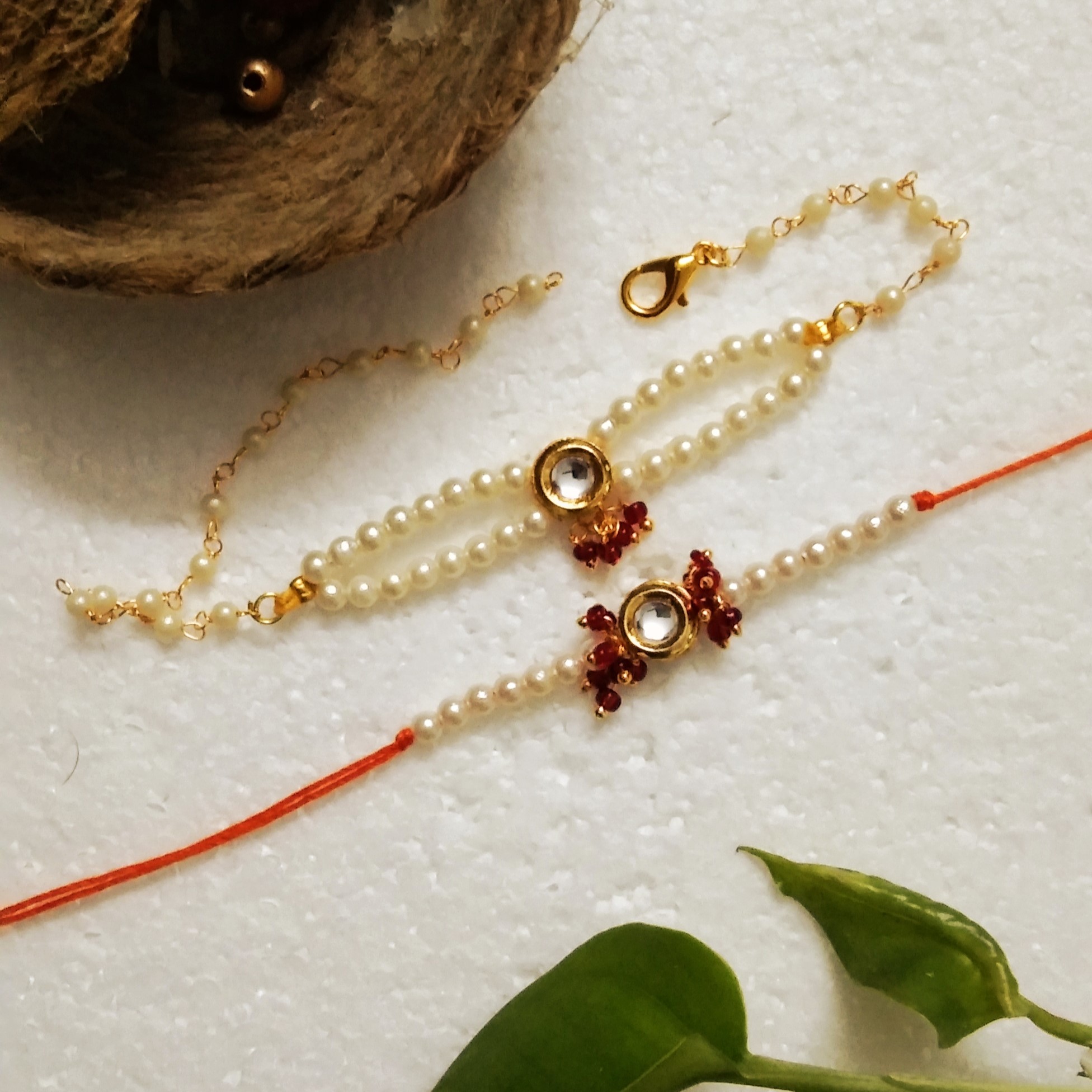 Adorable Rakhi with Kundan and Acrylic Beads